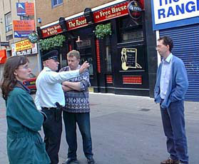 RUC officer giving directions to a pub